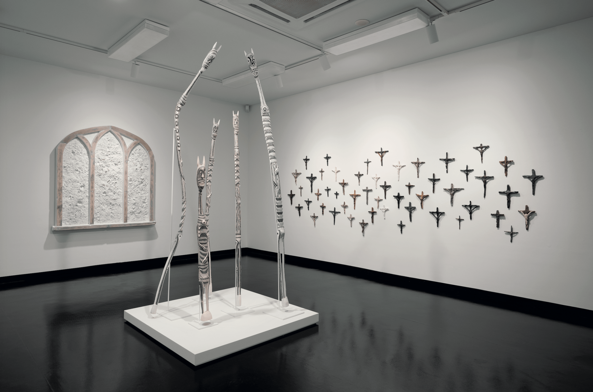 From far left to right:
Michael Needham
Interstice 2017
Nawurapu Wunuŋmurra
Mokuy 2012
Richard Lewer
Crucifixes 2018
Installation view, La Trobe Art Institute, 2020
Photograph: Ian Hill